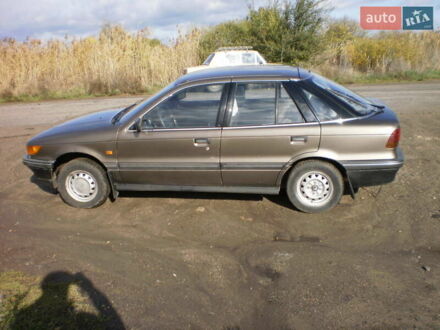 Мицубиси Лансер 1991 в Южноукраинске на Automoto.ua Коричневый Мицубиси Лансер, объемом двигателя 1.5 л и пробегом 220 тыс. км за 1800 $, фото 1 на Automoto.ua