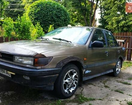 Коричневий Міцубісі Lancer, об'ємом двигуна 1.5 л та пробігом 608 тис. км за 900 $, фото 1 на Automoto.ua