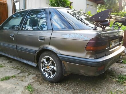 Коричневый Мицубиси Лансер, объемом двигателя 1.5 л и пробегом 608 тыс. км за 900 $, фото 1 на Automoto.ua