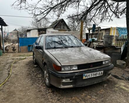 Коричневий Міцубісі Lancer, об'ємом двигуна 1.8 л та пробігом 200 тис. км за 1136 $, фото 1 на Automoto.ua
