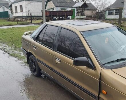 Коричневий Міцубісі Lancer, об'ємом двигуна 2 л та пробігом 345 тис. км за 700 $, фото 1 на Automoto.ua