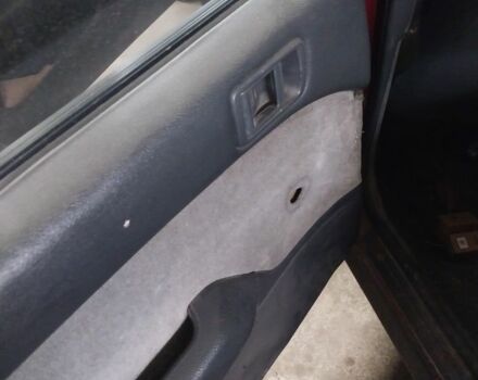 Червоний Міцубісі Lancer, об'ємом двигуна 1.5 л та пробігом 380 тис. км за 1419 $, фото 7 на Automoto.ua