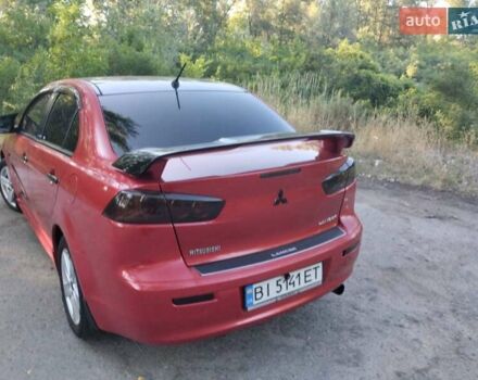Червоний Міцубісі Lancer, об'ємом двигуна 2 л та пробігом 168 тис. км за 6800 $, фото 8 на Automoto.ua