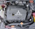Червоний Міцубісі Lancer, об'ємом двигуна 2 л та пробігом 168 тис. км за 6800 $, фото 2 на Automoto.ua
