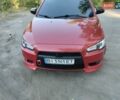 Червоний Міцубісі Lancer, об'ємом двигуна 2 л та пробігом 168 тис. км за 6800 $, фото 1 на Automoto.ua