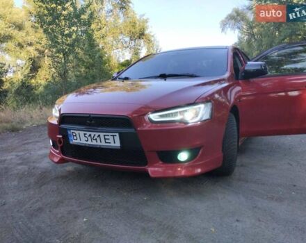 Червоний Міцубісі Lancer, об'ємом двигуна 2 л та пробігом 168 тис. км за 6800 $, фото 1 на Automoto.ua