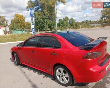 Червоний Міцубісі Lancer, об'ємом двигуна 2 л та пробігом 168 тис. км за 6800 $, фото 13 на Automoto.ua