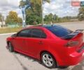 Червоний Міцубісі Lancer, об'ємом двигуна 2 л та пробігом 168 тис. км за 6800 $, фото 13 на Automoto.ua