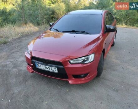 Червоний Міцубісі Lancer, об'ємом двигуна 2 л та пробігом 168 тис. км за 6800 $, фото 7 на Automoto.ua