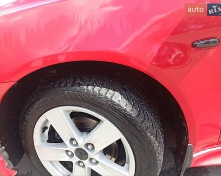Червоний Міцубісі Lancer, об'ємом двигуна 2 л та пробігом 168 тис. км за 6800 $, фото 9 на Automoto.ua