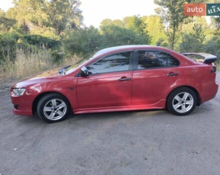Червоний Міцубісі Lancer, об'ємом двигуна 2 л та пробігом 168 тис. км за 6800 $, фото 3 на Automoto.ua