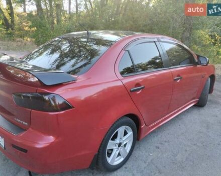 Червоний Міцубісі Lancer, об'ємом двигуна 2 л та пробігом 168 тис. км за 6800 $, фото 6 на Automoto.ua