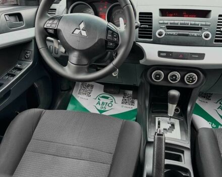 Красный Мицубиси Лансер, объемом двигателя 1.8 л и пробегом 195 тыс. км за 6900 $, фото 15 на Automoto.ua