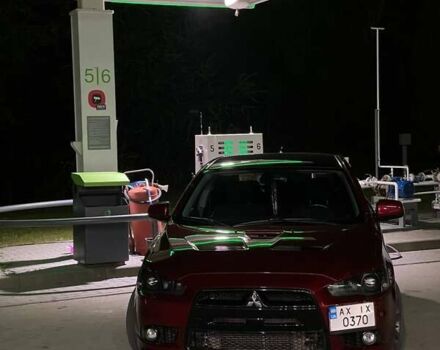 Красный Мицубиси Лансер, объемом двигателя 2 л и пробегом 128 тыс. км за 14700 $, фото 16 на Automoto.ua