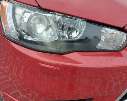 Червоний Міцубісі Lancer, об'ємом двигуна 2 л та пробігом 58 тис. км за 12900 $, фото 11 на Automoto.ua