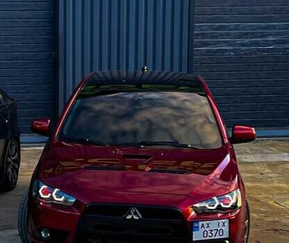 Красный Мицубиси Лансер, объемом двигателя 2 л и пробегом 128 тыс. км за 14700 $, фото 7 на Automoto.ua