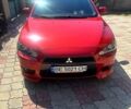 Красный Мицубиси Лансер, объемом двигателя 1.8 л и пробегом 191 тыс. км за 8100 $, фото 1 на Automoto.ua
