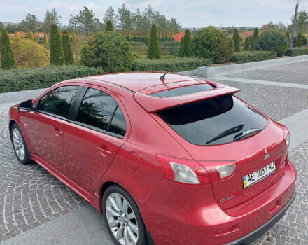 Червоний Міцубісі Lancer, об'ємом двигуна 2 л та пробігом 58 тис. км за 12900 $, фото 9 на Automoto.ua