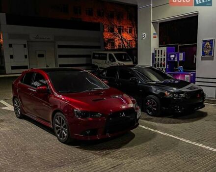 Красный Мицубиси Лансер, объемом двигателя 2 л и пробегом 128 тыс. км за 14700 $, фото 14 на Automoto.ua