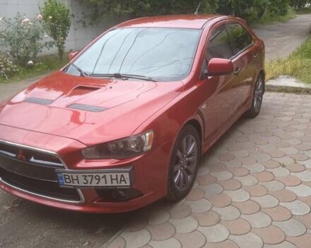 Червоний Міцубісі Lancer, об'ємом двигуна 2 л та пробігом 145 тис. км за 9500 $, фото 2 на Automoto.ua