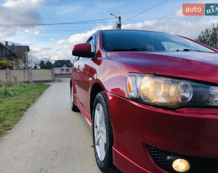 Мицубиси Лансер 2008 в Ивано-Франковске на Automoto.ua Красный Мицубиси Лансер, объемом двигателя 1.8 л и пробегом 180 тыс. км за 5400 $, фото 14 на Automoto.ua