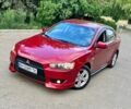 Червоний Міцубісі Lancer, об'ємом двигуна 1.8 л та пробігом 91 тис. км за 6800 $, фото 1 на Automoto.ua