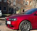 Красный Мицубиси Лансер, объемом двигателя 2 л и пробегом 128 тыс. км за 14700 $, фото 8 на Automoto.ua