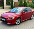 Красный Мицубиси Лансер, объемом двигателя 1.8 л и пробегом 187 тыс. км за 7200 $, фото 1 на Automoto.ua