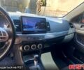 Красный Мицубиси Лансер, объемом двигателя 1.8 л и пробегом 191 тыс. км за 8100 $, фото 6 на Automoto.ua
