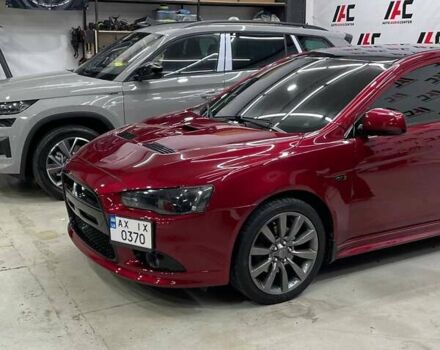 Красный Мицубиси Лансер, объемом двигателя 2 л и пробегом 128 тыс. км за 14700 $, фото 4 на Automoto.ua