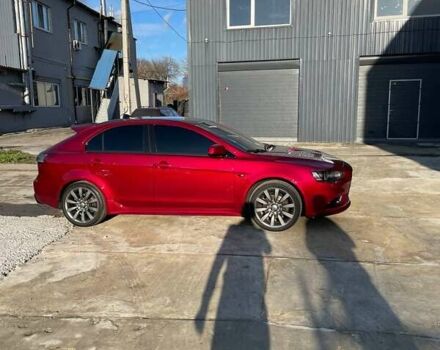 Красный Мицубиси Лансер, объемом двигателя 2 л и пробегом 128 тыс. км за 14700 $, фото 10 на Automoto.ua