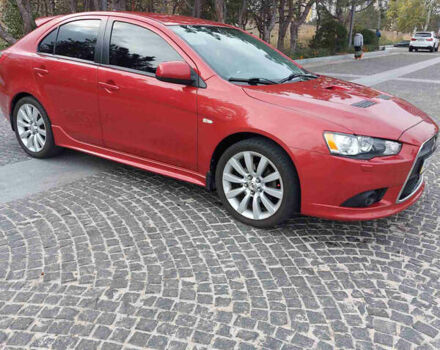 Червоний Міцубісі Lancer, об'ємом двигуна 2 л та пробігом 58 тис. км за 12900 $, фото 1 на Automoto.ua