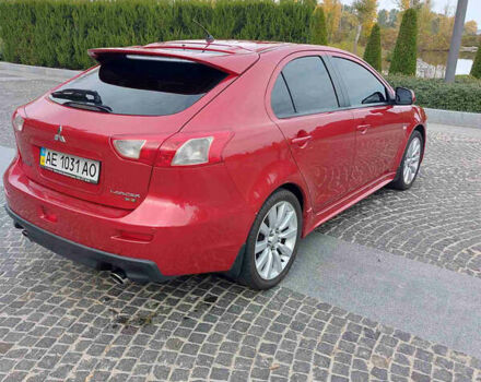 Червоний Міцубісі Lancer, об'ємом двигуна 2 л та пробігом 58 тис. км за 12900 $, фото 10 на Automoto.ua