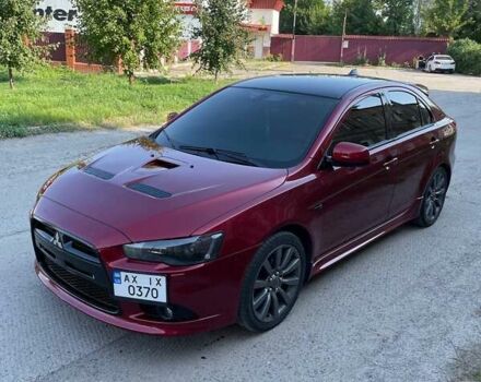 Красный Мицубиси Лансер, объемом двигателя 2 л и пробегом 128 тыс. км за 14700 $, фото 17 на Automoto.ua