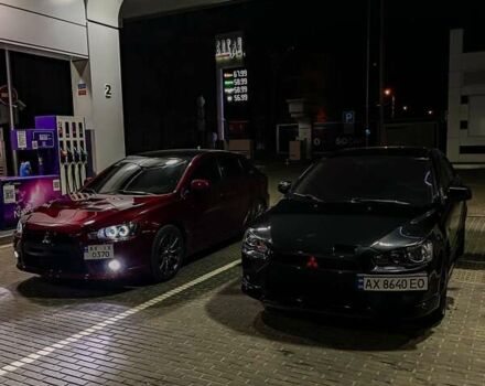 Красный Мицубиси Лансер, объемом двигателя 2 л и пробегом 128 тыс. км за 14700 $, фото 15 на Automoto.ua