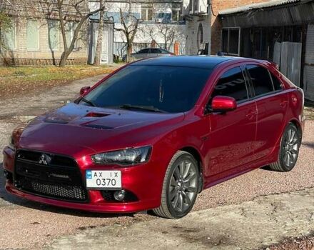 Красный Мицубиси Лансер, объемом двигателя 2 л и пробегом 128 тыс. км за 14700 $, фото 9 на Automoto.ua