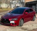 Красный Мицубиси Лансер, объемом двигателя 2 л и пробегом 128 тыс. км за 14700 $, фото 9 на Automoto.ua