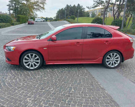 Червоний Міцубісі Lancer, об'ємом двигуна 2 л та пробігом 58 тис. км за 12900 $, фото 4 на Automoto.ua