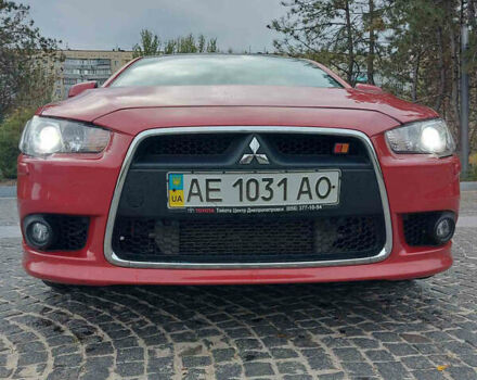 Червоний Міцубісі Lancer, об'ємом двигуна 2 л та пробігом 58 тис. км за 12900 $, фото 13 на Automoto.ua