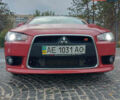 Червоний Міцубісі Lancer, об'ємом двигуна 2 л та пробігом 58 тис. км за 12900 $, фото 13 на Automoto.ua
