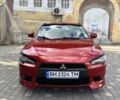 Красный Мицубиси Лансер, объемом двигателя 1.8 л и пробегом 186 тыс. км за 7300 $, фото 1 на Automoto.ua