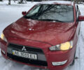 Красный Мицубиси Лансер, объемом двигателя 1.8 л и пробегом 357 тыс. км за 5500 $, фото 1 на Automoto.ua