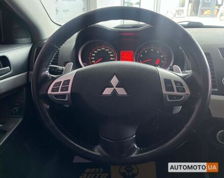 Красный Мицубиси Лансер, объемом двигателя 1.8 л и пробегом 140 тыс. км за 7800 $, фото 16 на Automoto.ua