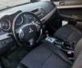 Червоний Міцубісі Lancer, об'ємом двигуна 1.8 л та пробігом 241 тис. км за 6500 $, фото 3 на Automoto.ua