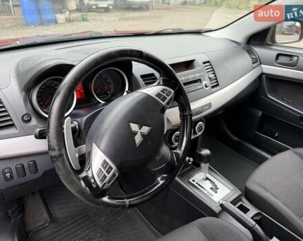 Червоний Міцубісі Lancer, об'ємом двигуна 1.8 л та пробігом 168 тис. км за 5600 $, фото 7 на Automoto.ua