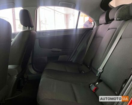 Красный Мицубиси Лансер, объемом двигателя 1.8 л и пробегом 140 тыс. км за 7800 $, фото 9 на Automoto.ua