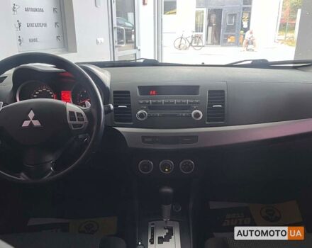 Красный Мицубиси Лансер, объемом двигателя 1.8 л и пробегом 140 тыс. км за 7800 $, фото 14 на Automoto.ua
