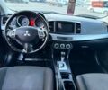 Червоний Міцубісі Lancer, об'ємом двигуна 1.8 л та пробігом 179 тис. км за 5700 $, фото 12 на Automoto.ua