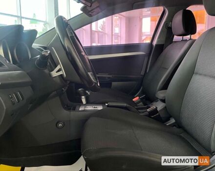 Красный Мицубиси Лансер, объемом двигателя 1.8 л и пробегом 140 тыс. км за 7800 $, фото 10 на Automoto.ua