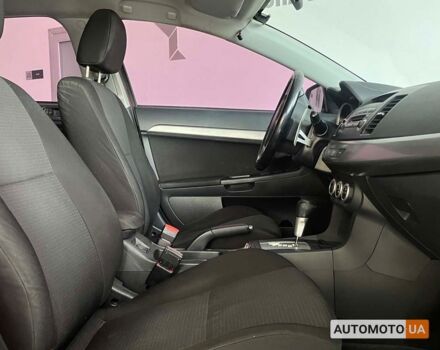 Красный Мицубиси Лансер, объемом двигателя 1.8 л и пробегом 140 тыс. км за 7800 $, фото 8 на Automoto.ua